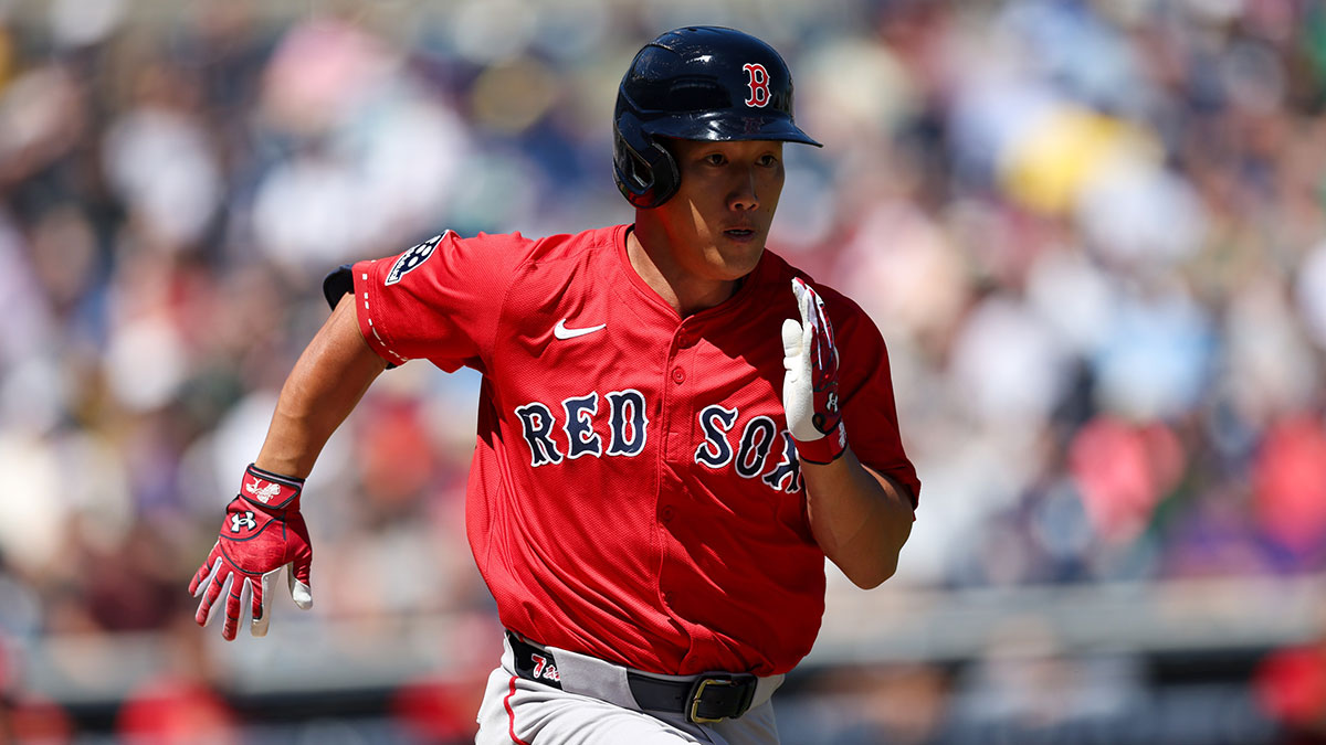 Boston Red Sox outfielder Masataka Yoshida (7) runs to first base against the New York Yankees in the first inning during spring training.