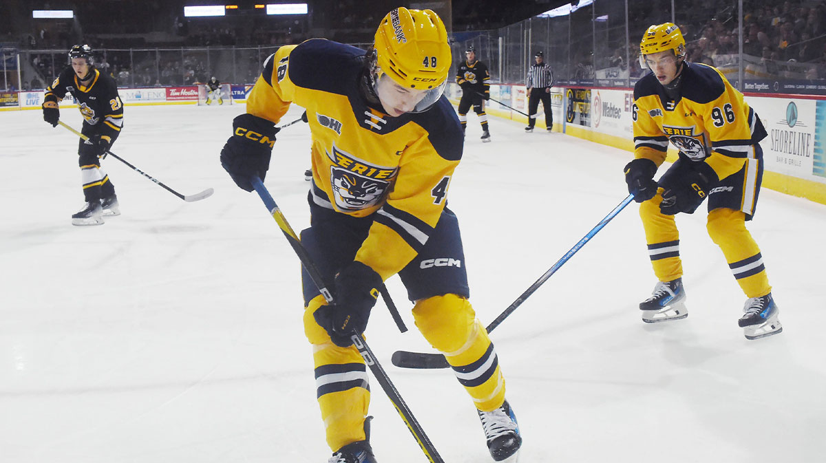 Erie Otters defenseman Matthew Schaefer controls the puck against the Sarnia Sting at Erie Insurance Arena