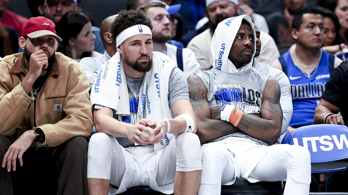 Mavericks guard Kyrie Irving (right) and Dallas Mavericks guard Klay Thompson (31) react on the bench against the Milwaukee Bucks during the second half at American Airlines Center