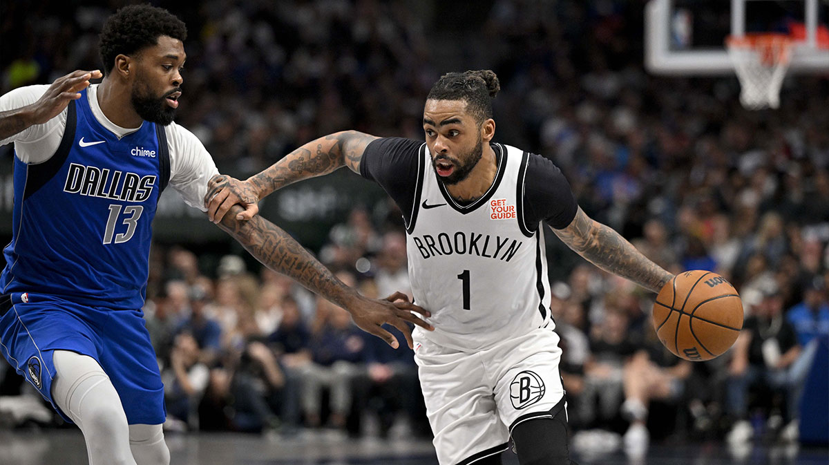 Brooklyn Nets guard D'Angelo Russell (1) drives to the basket past Dallas Mavericks forward Naji Marshall (13) during the second half at the American Airlines Center.
