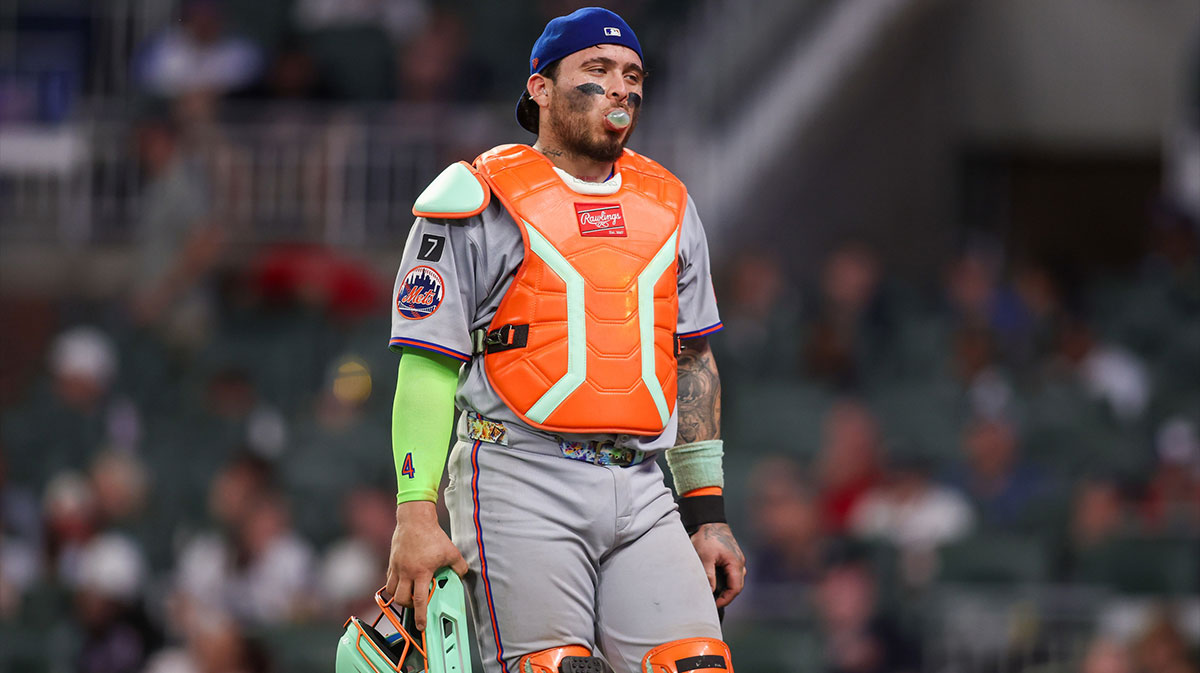 New York Mets catcher Francisco Alvarez (4) walks to the dugout against the Atlanta Braves in the eighth inning at Truist Park.