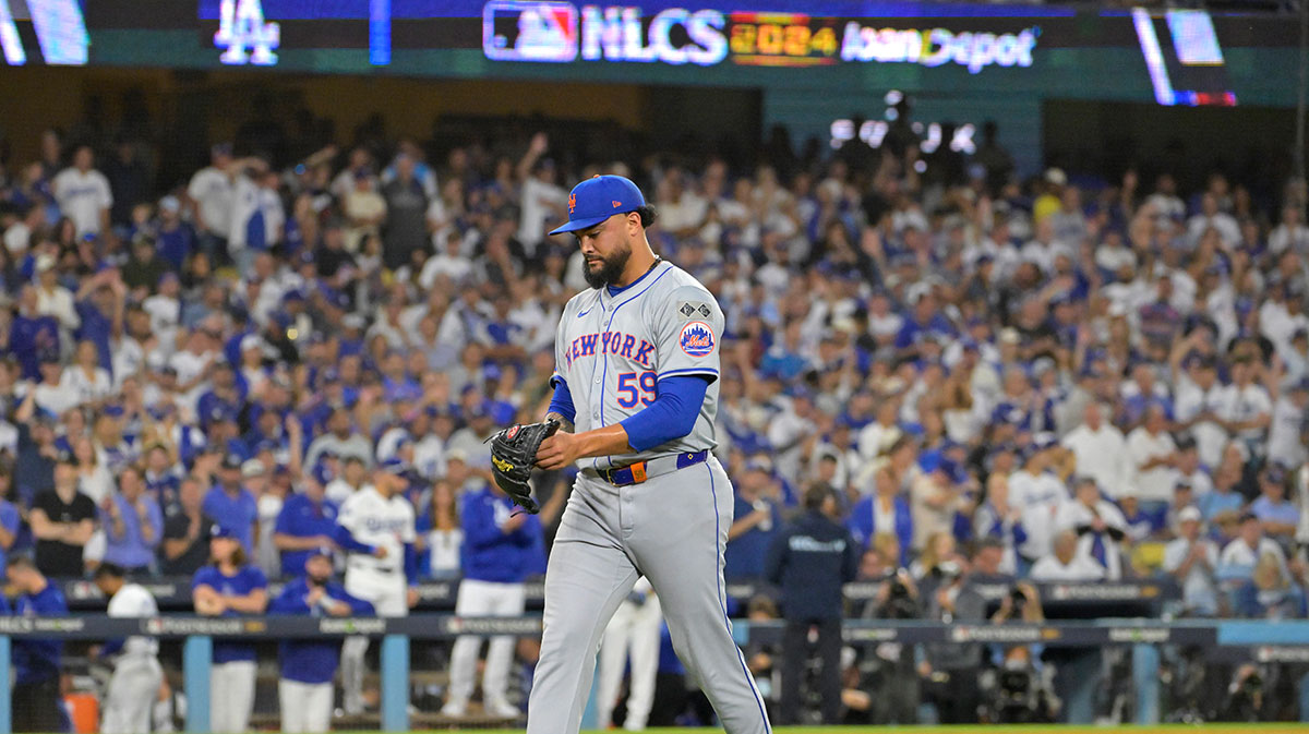 New York Mets pitcher Sean Manaea (59) walks to the dugout after being relieved in the third inning against the Los Angeles Dodgers during game six of the NLCS for the 2024 MLB playoffs at Dodger Stadium.