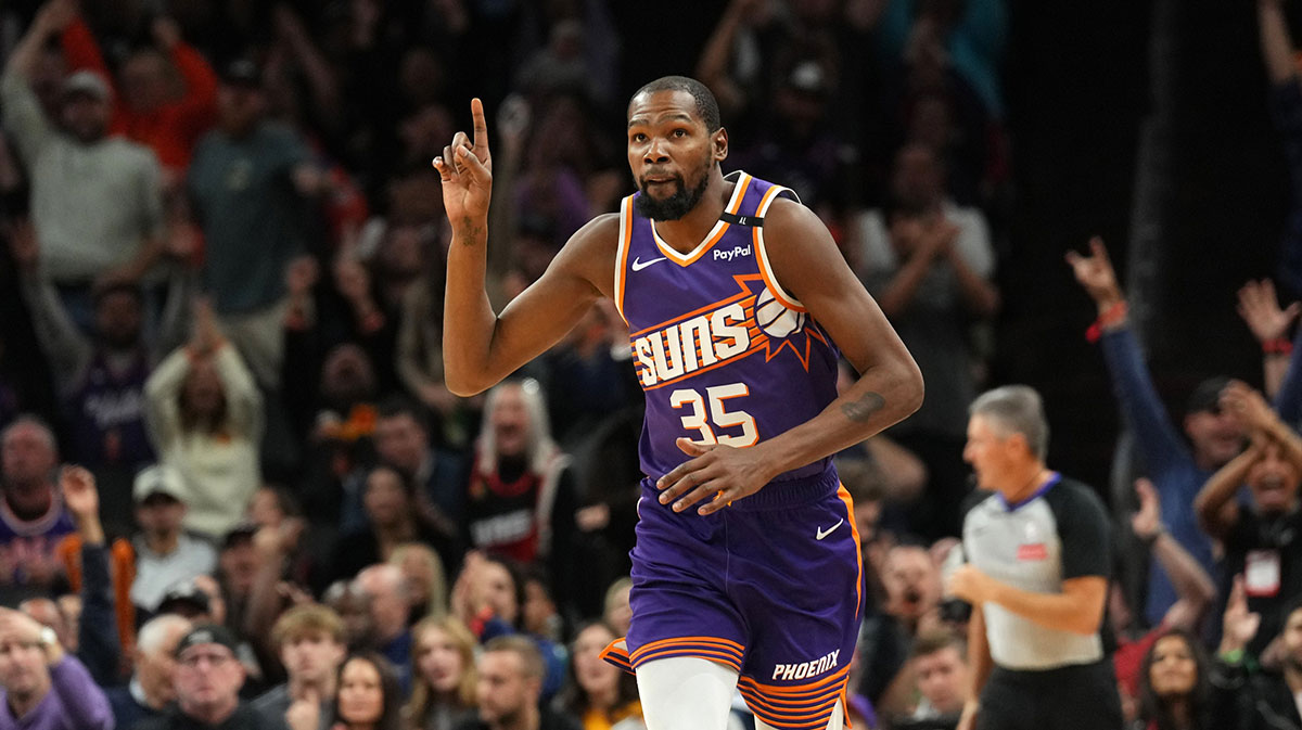 Phoenix Suns forward Kevin Durant (35) celebrates a basket against the Miami Heat during the second half at Footprint Center.