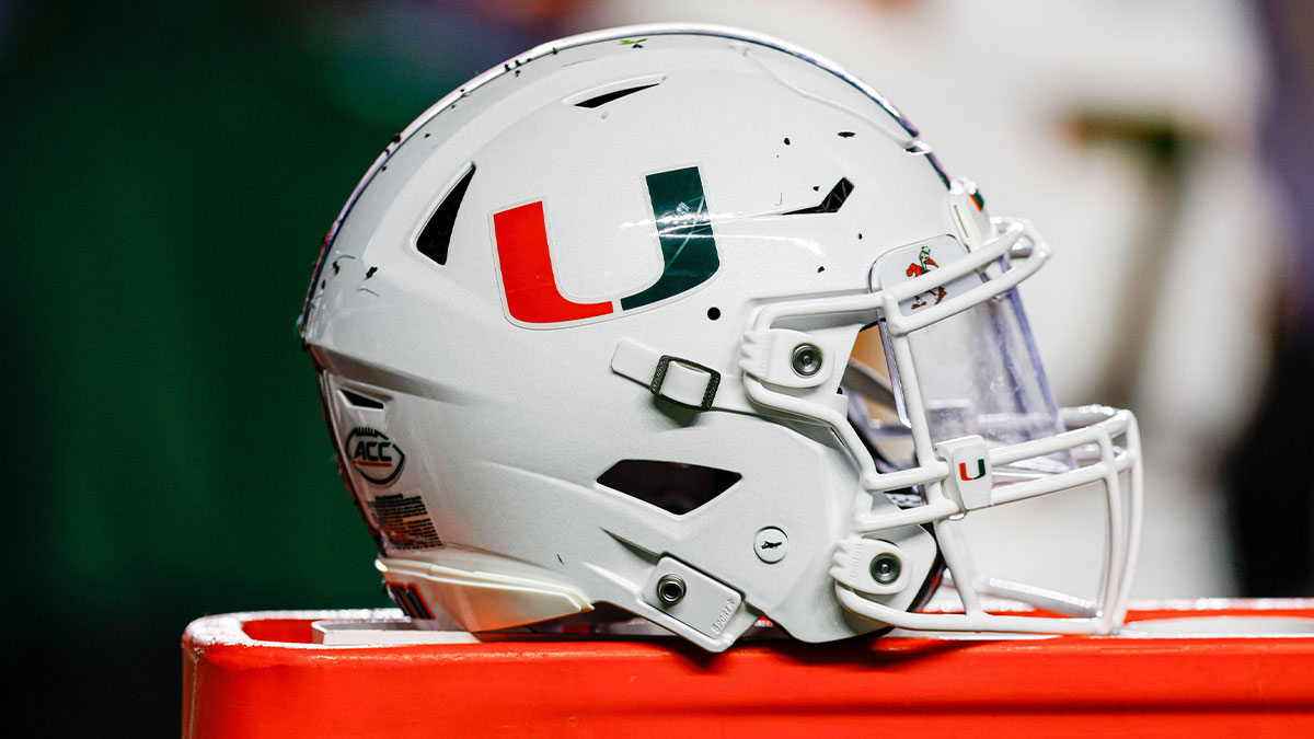 Miami Hurricanes helmet sits on bench as the Hurricanes play against the North Carolina Tar Heels at Kenan Memorial Stadium.