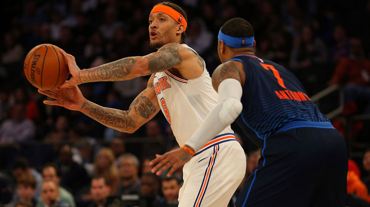 New York Knicks small forward Michael Beasley (8) passes the ball defended by Oklahoma City Thunder power forward Carmelo Anthony (7) during the third quarter at Madison Square Garden.