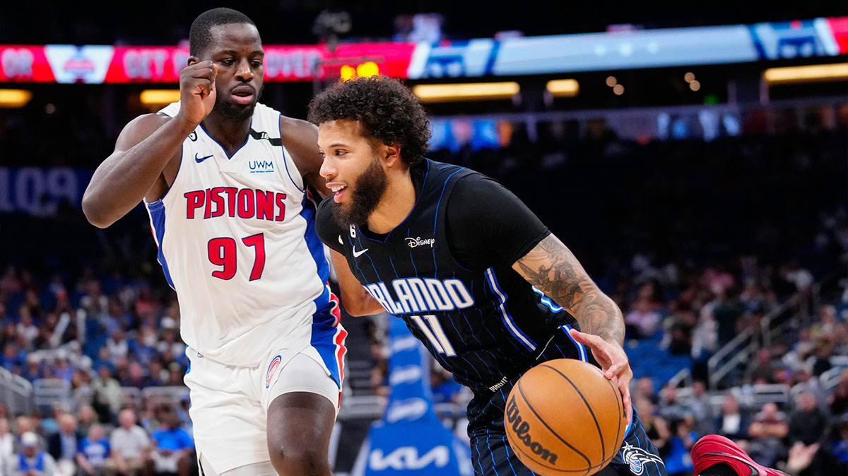 Orlando Magic guard Michael Carter-Williams (11) dribbles the ball past Detroit Pistons forward Eugene Omoruyi (97) during the second half at Amway Center.