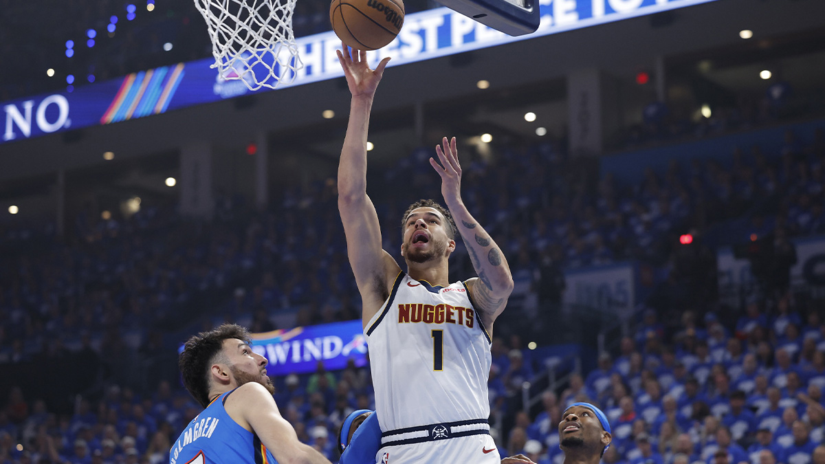 Denver Nuggets forward Michael Porter Jr. (1) shoots beside Oklahoma City Thunder forward Chet Holmgren (7) in the first quarter during game seven of the second round for the 2025 NBA Playoffs at Paycom Center.