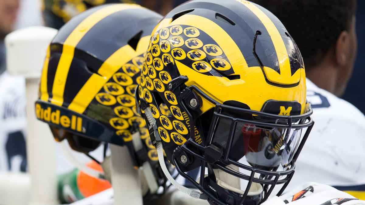 A general view of Michigan Wolverines helmets on the sideline during the game against the Ohio State Buckeyes at Ohio Stadium. Ohio State won the game 30-27 in double overtime