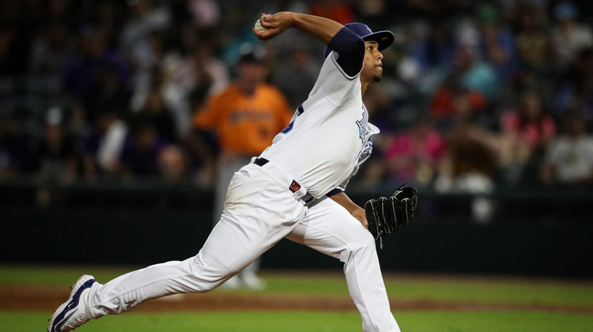 Hooks pitcher Miguel Ullola throws a pitch on Opening Night at Whataburger Field on Friday, April 5, 2024, in Corpus Christi, Texas.