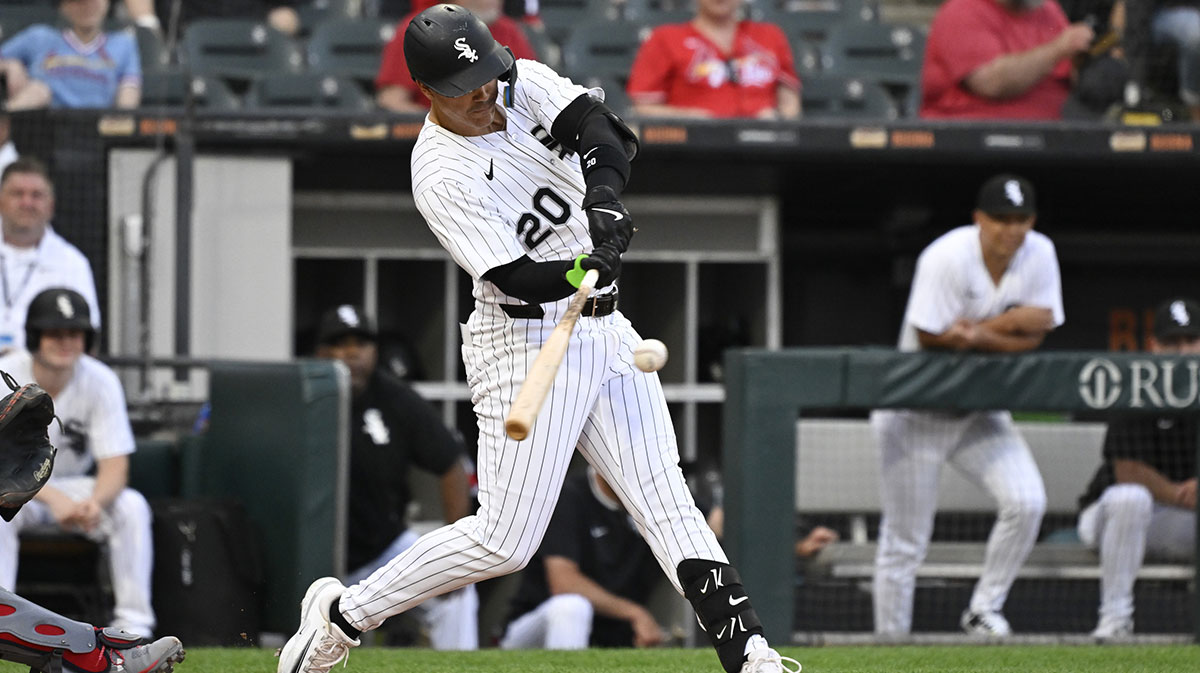 Chicago White Sox third base Miguel Vargas (20) doubles during the first inning against the St. Louis Cardinals at Rate Field.