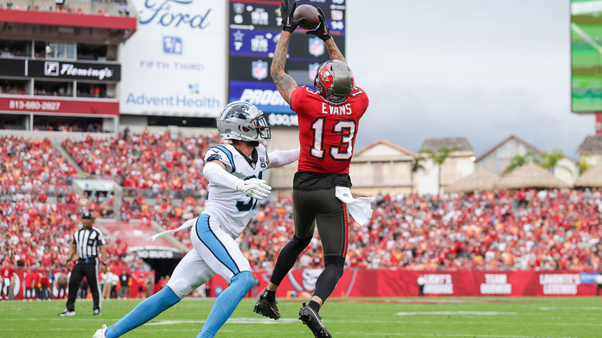 Dec 29, 2024; Tampa, Florida, USA; Tampa Bay Buccaneers wide receiver Mike Evans (13) catches a pass for a two point conversion against the Carolina Panthers in the second quarter at Raymond James Stadium.