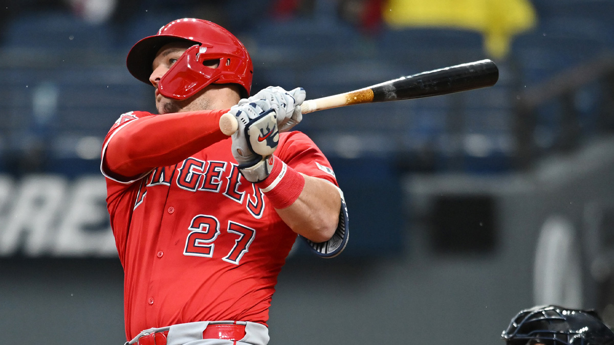 Los Angeles Angels designated hitter Mike Trout (27) hits a single during the fourth inning against the Cleveland Guardians at Progressive Field.