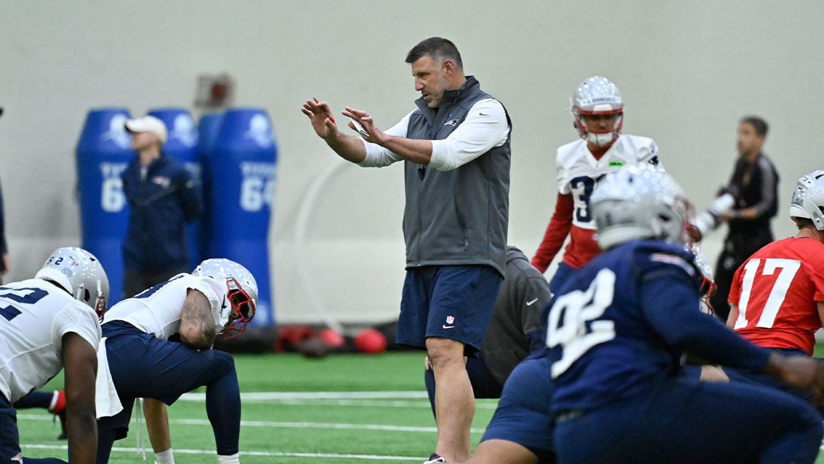 New England Patriots head coach Mike Vrabel (c) works with players at rookie camp at Gillette Stadium.
