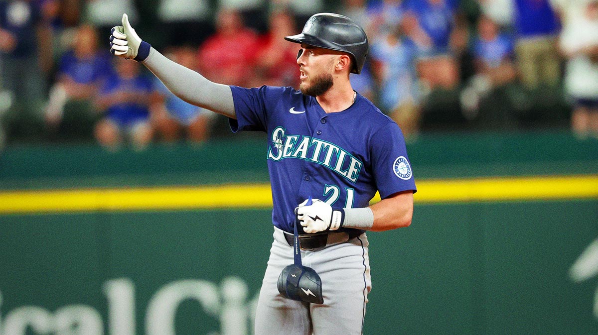 Seattle Mariners third baseman Miles Mastrobuoni (21) reacts after hitting an rbi single during the twelfth inning against the Texas Rangers at Globe Life Field.