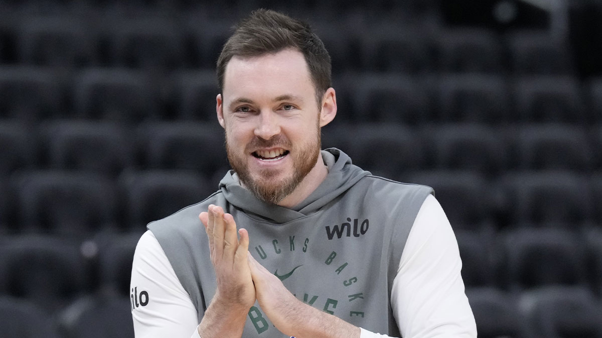Milwaukee Bucks guard Pat Connaughton (24) walks onto the court for pregame warmups before a game against the San Antonio Spurs at Fiserv Forum.