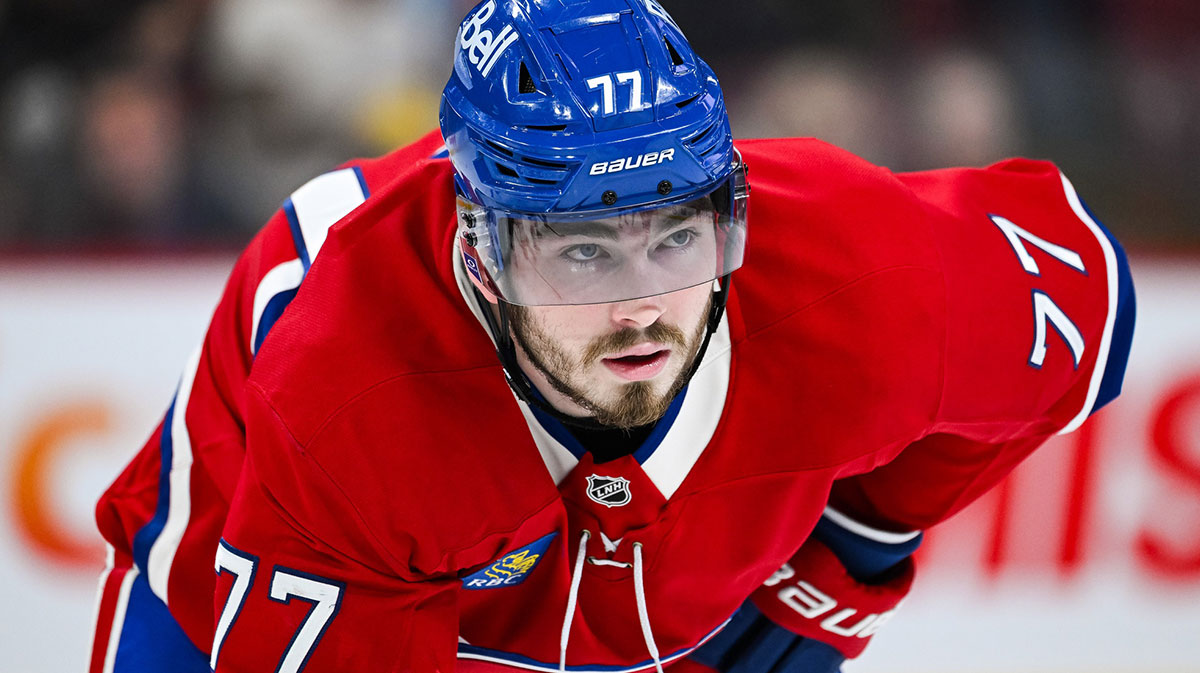 Montreal Canadiens center Kirby Dach (77) waits for a face-off against the New Jersey Devils during the second period at Bell Centre