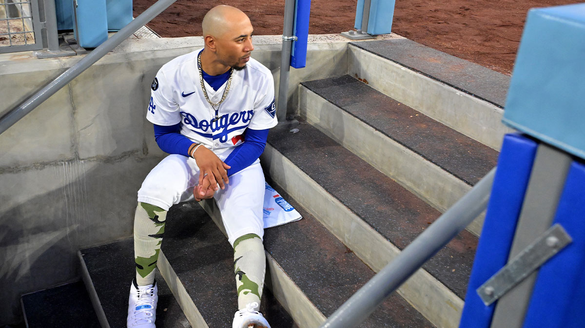 May 16, 2025; Los Angeles, California, USA; Los Angeles Dodgers shortstop Mookie Betts (50) looks on from the dugout steps during the game against the Los Angeles Angels at Dodger Stadium. Mandatory Credit: Jayne Kamin-Oncea-Imagn Images