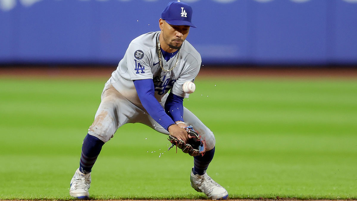 Los Angeles Dodgers shortstop Mookie Betts (50) fields a ground ball hit by New York Mets catcher Francisco Alvarez (not pictured) during the third inning at Citi Field.