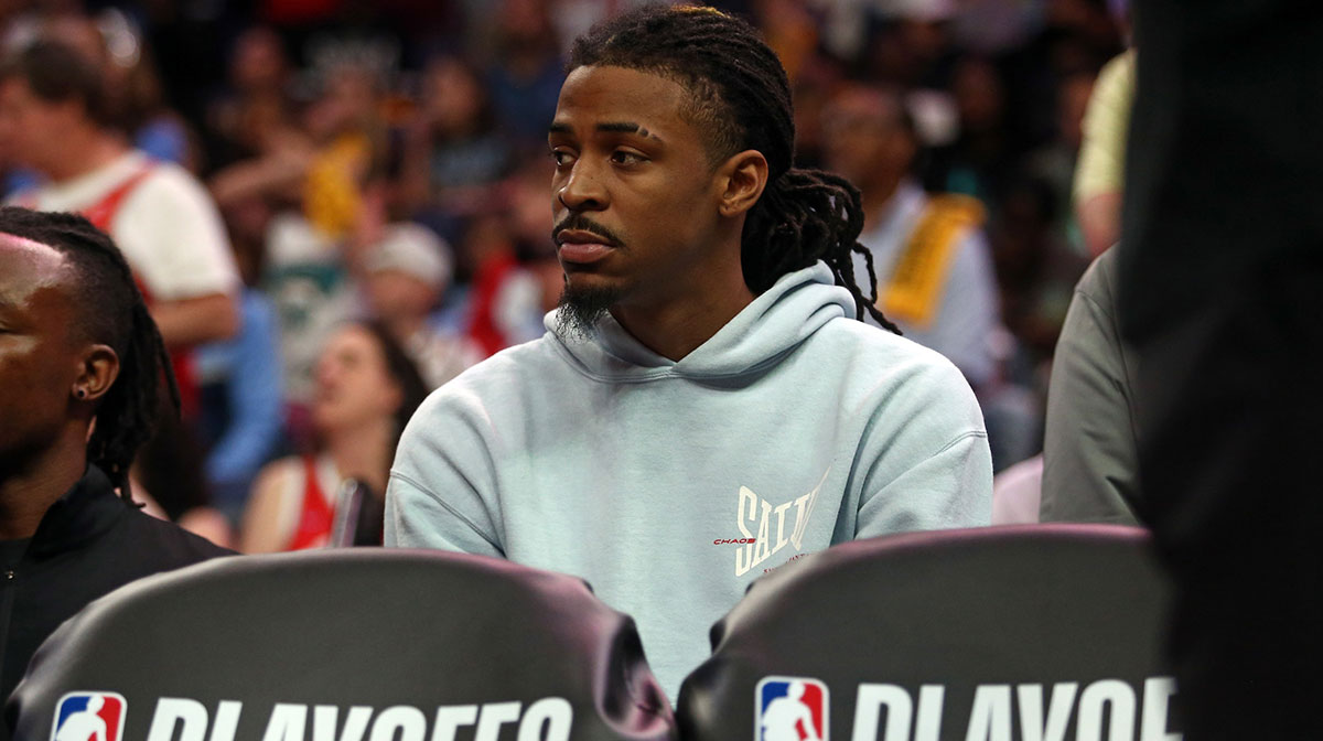 Memphis Grizzlies guard Ja Morant (12) looks on from the bench area during the fourth quarter against the Oklahoma City Thunder during game four for the first round of the 2024 NBA Playoffs at FedExForum.