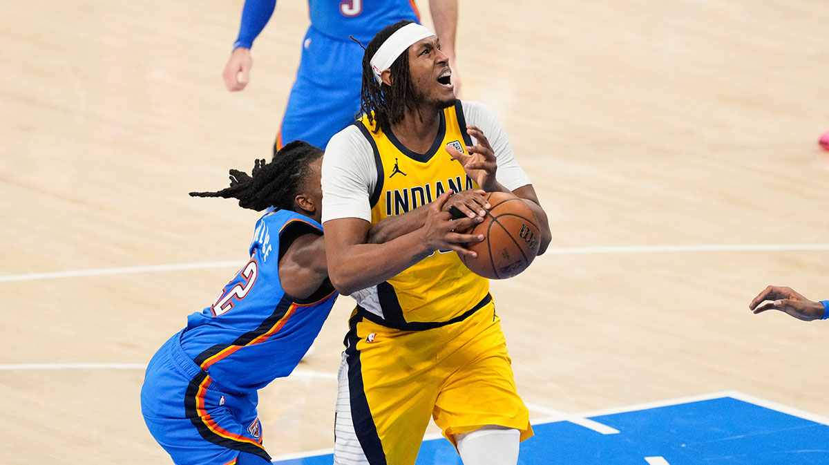 Indiana Pacers center Myles Turner (33) looks to shoot while Oklahoma City Thunder guard Cason Wallace (22) defends during the first half of game seven of the 2025 NBA Finals at Paycom Center.