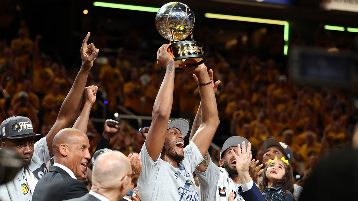 Indiana Pacers center Myles Turner (33) raises the trophy after game six of the eastern conference finals against the New York Knicks for the 2025 NBA Playoffs at Gainbridge Fieldhouse.