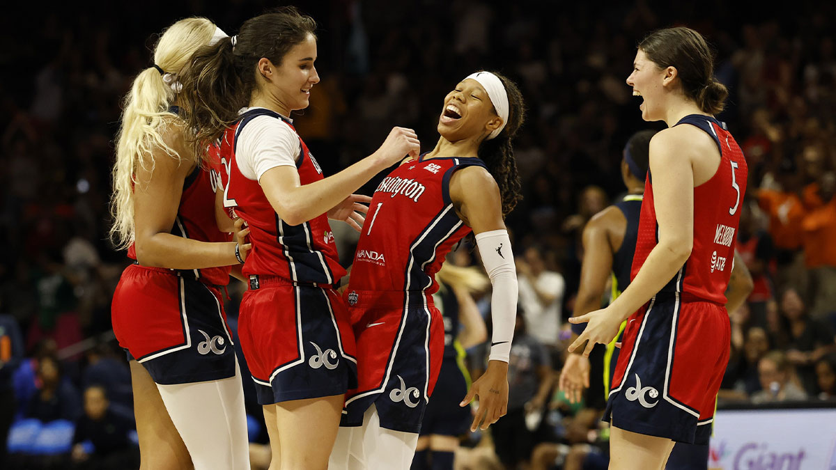 Dallas Wings guard Paige Bueckers (5) dribbles the ball as Washington Mystics guard Sonia Citron (22) defends in the first half at Entertainment & Sports Arena.