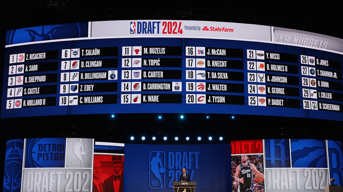 NBA commissioner Adam Silver speaks at the podium after the first round of the 2024 NBA Draft at Barclays Center. Bailey, Claxton