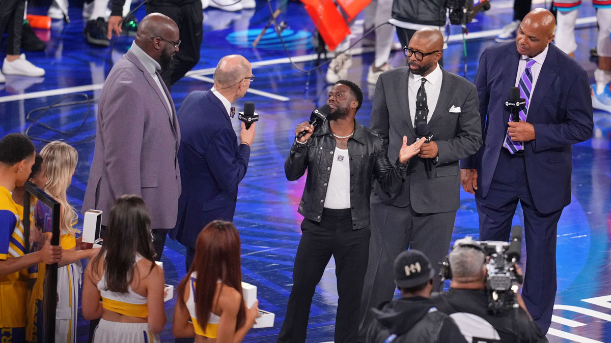 Kevin Hart talks with Ernie Johnson, Jr. after the 2025 NBA All Star Game at Chase Center.