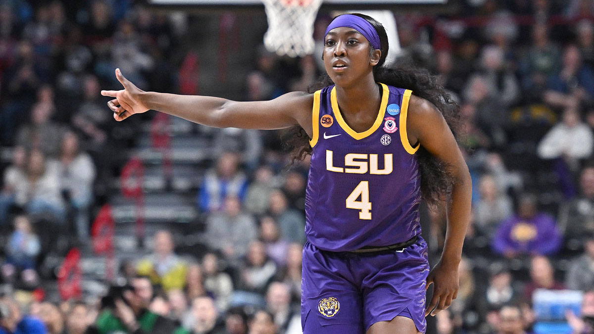 Mar 30, 2025; Spokane, WA, USA; LSU Lady Tigers guard Flau'Jae Johnson (4) reacts after play against the UCLA Bruins during the first half of a Elite 8 NCAA Tournament basketball game at Spokane Arena. Mandatory Credit: James Snook-Imagn Images
