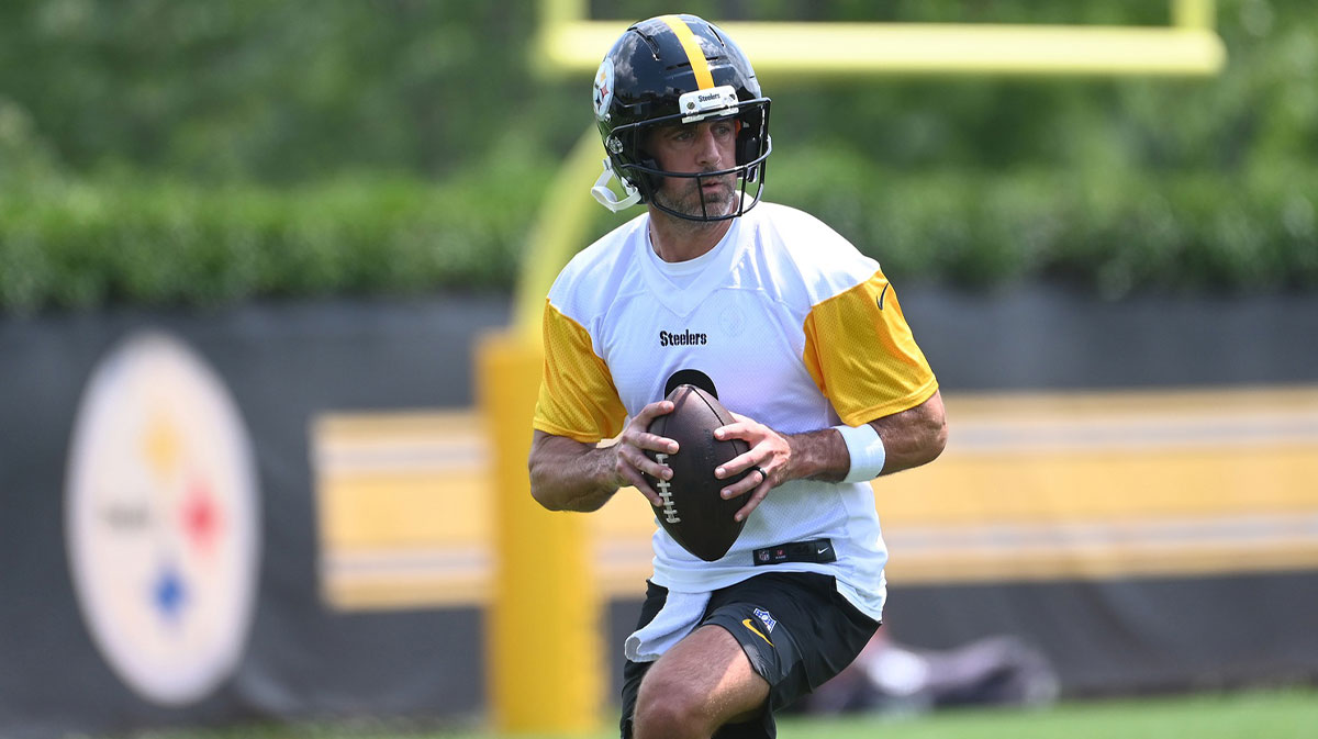 Pittsburgh Steelers quarterback Aaron Rodgers (8) drops back to pass during minicamp at their South Side facility.