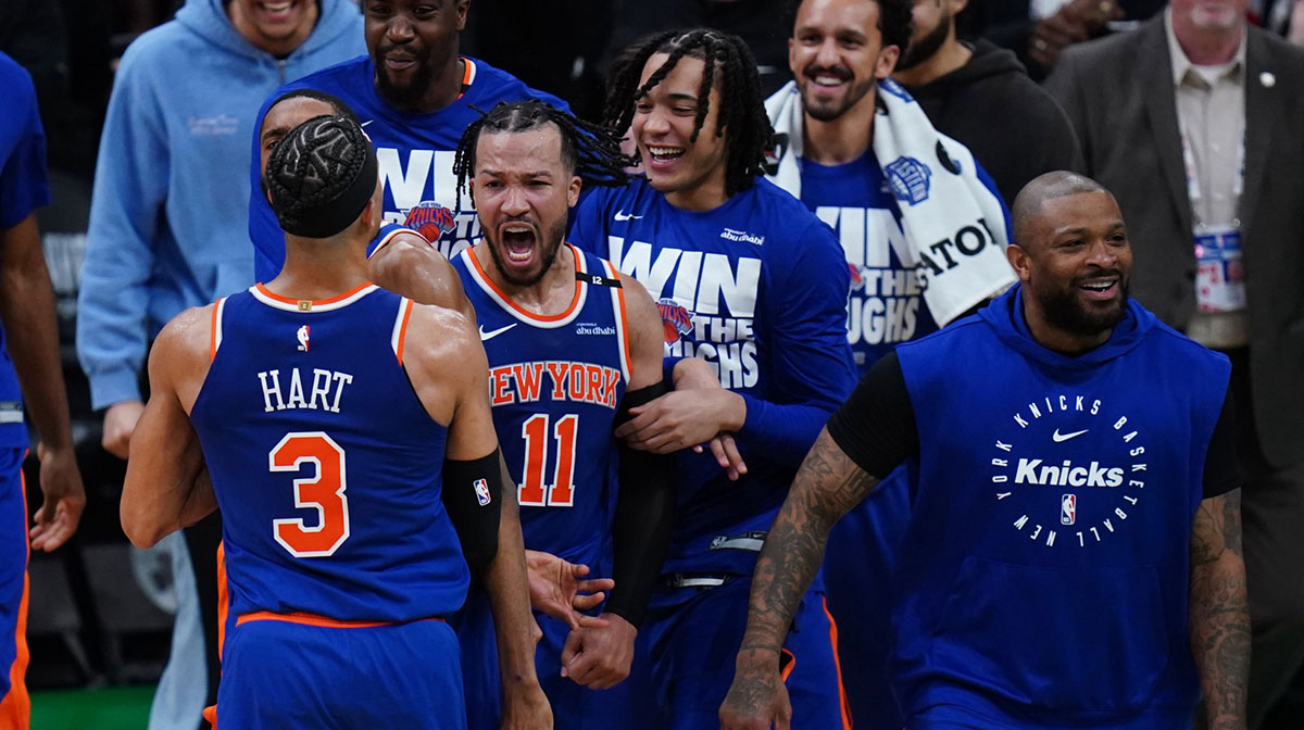 New York Knicks guard Jalen Brunson (11) reacts with teammates after defeating the Boston Celtics in overtime during game one of the second round for the 2025 NBA Playoffs at TD Garden.