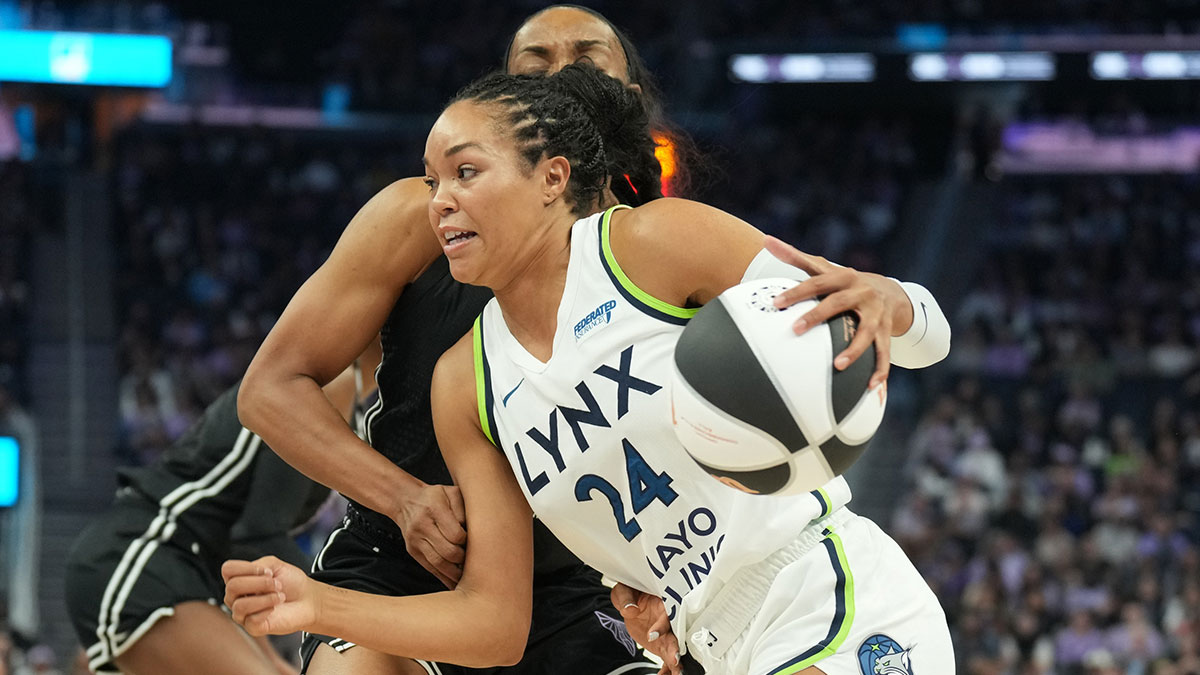 Minnesota Lynx forward Napheesa Collier (24) dribbles against Golden State Valkyries forward Kayla Thornton (back) during the first quarter at Chase Center.