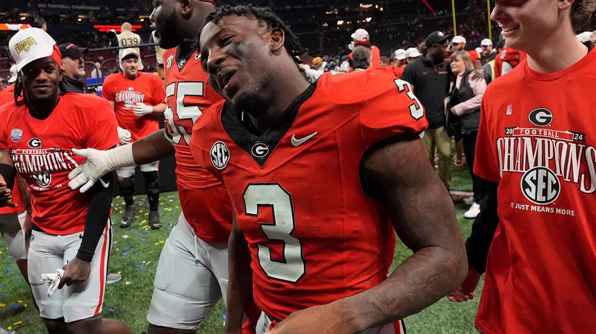 Georgia running back Nate Frazier (3) celebrates after the winning the SEC championship game against Texas in Atlanta, on Saturday, Dec. 7, 2024. Georgia won 22-19.