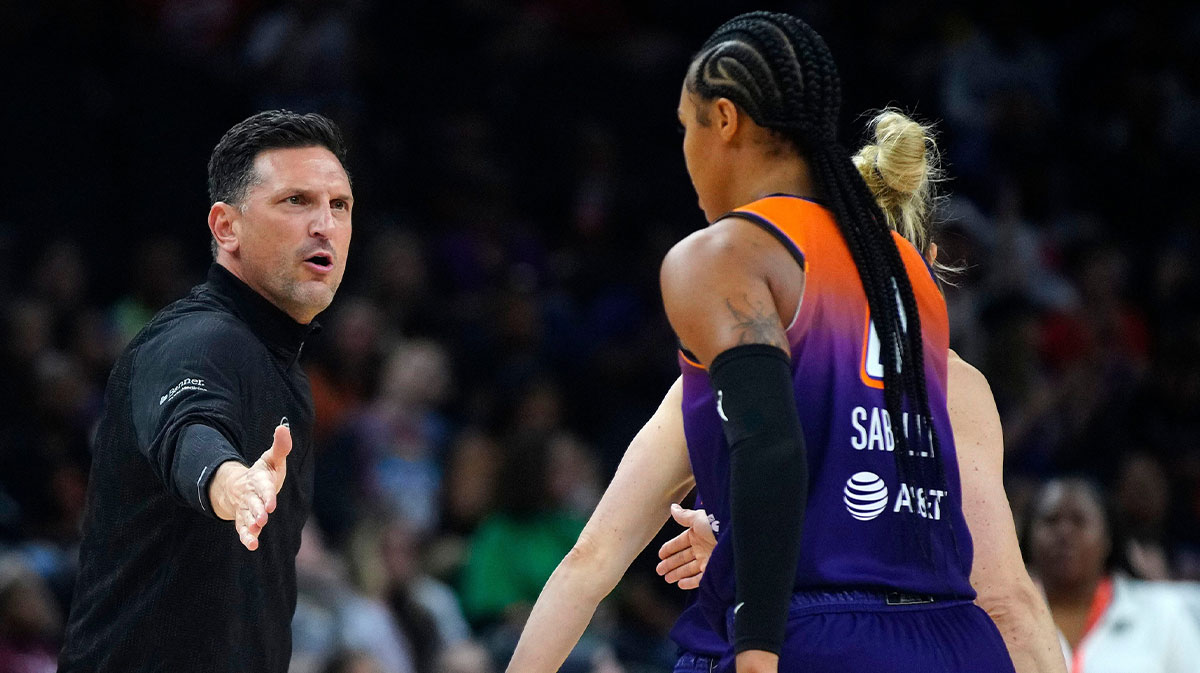 Mercury head coach Nate Tibbetts high-fives his players as they play against the Lynx at PHX Arena in Phoenix, on May 30, 2025.
