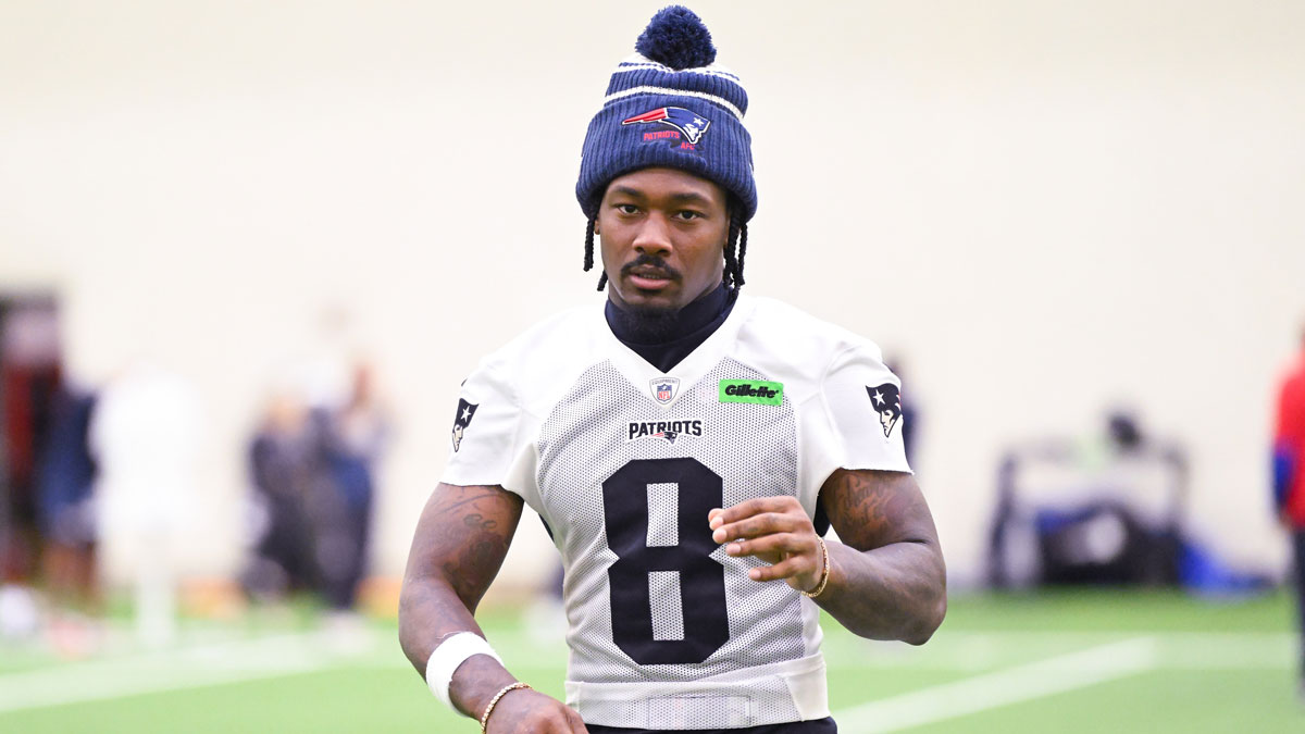 New England Patriots wide receiver Stefon Diggs (8) walks to the podium to speak to the media after minicamp held in the WIN Field House at Gillette Stadium.