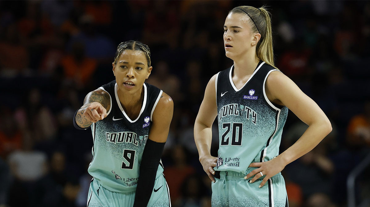 New York Liberty guard Natasha Cloud (9) talks with Liberty guard Sabrina Ionescu (20) against the Washington Mystics in the first half at Entertainment & Sports Arena.