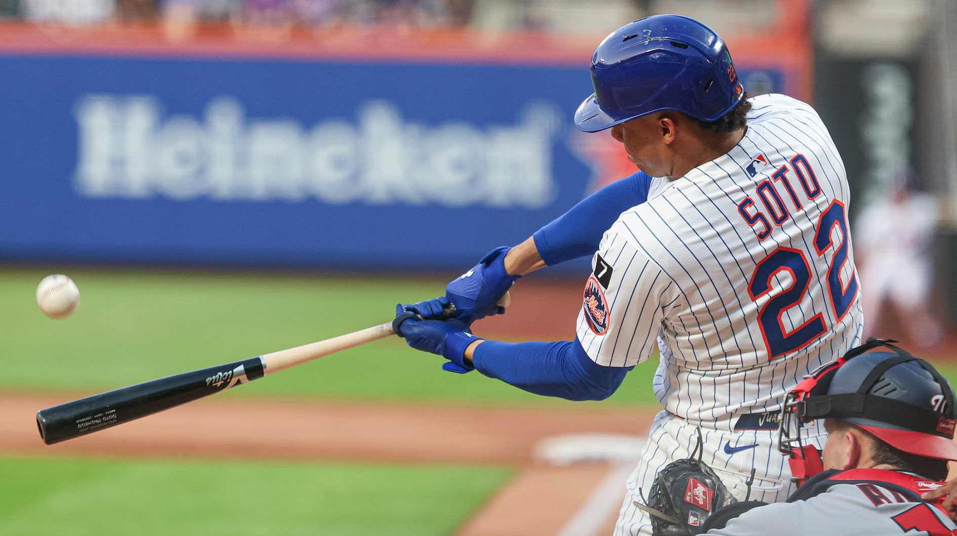 New York Mets right fielder Juan Soto (22) hits a two run home run during the third inning against the Washington Nationals at Citi Field.