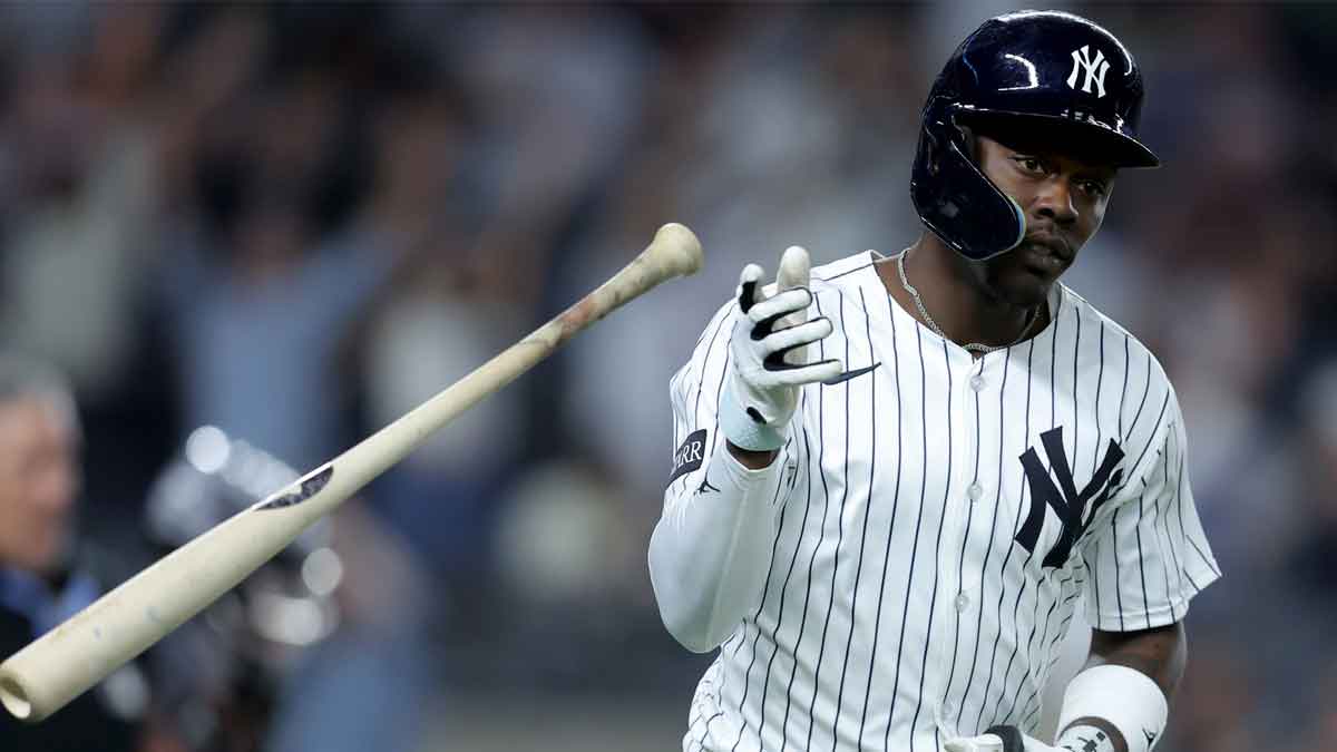 New York Yankees third baseman Jazz Chisholm Jr. (13) flips his bat after hitting a solo home run against the Cleveland Guardians during the seventh inning at Yankee Stadium.