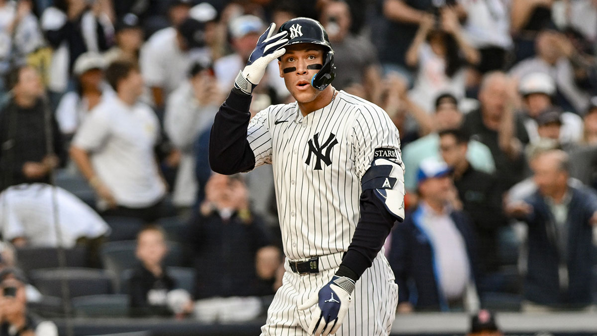 New York Yankees outfielder Aaron Judge (99) reacts after hitting a two-run home run against the Boston red Sox during the first inning at Yankee Stadium.