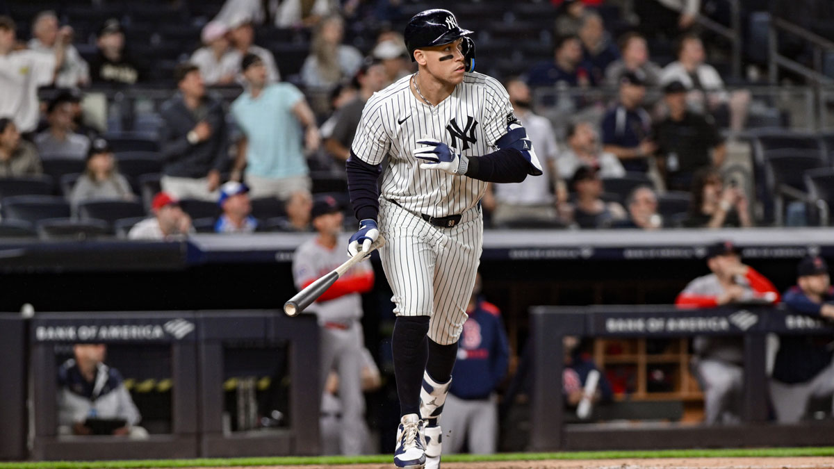 Jun 8, 2025; Bronx, New York, USA; New York Yankees outfielder Aaron Judge (99) hits a two-run home run against the Boston Red Sox during the ninth inning at Yankee Stadium. Mandatory Credit: John Jones-Imagn Images