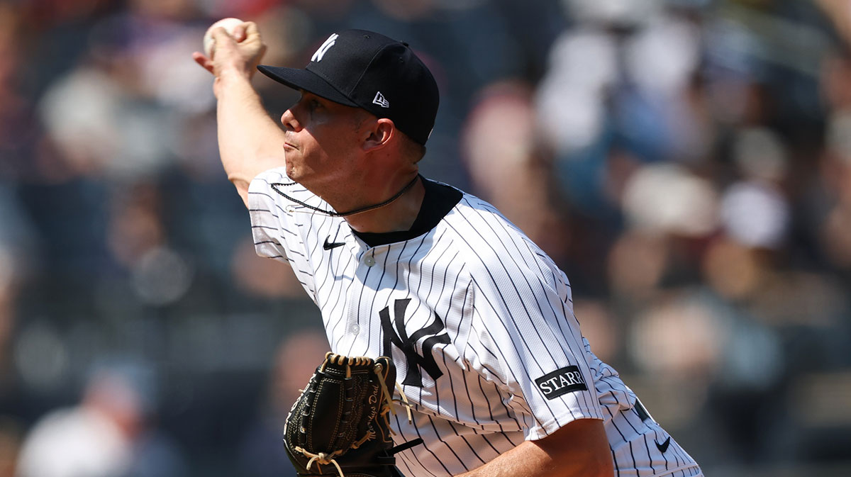 New York Yankees pitcher Allan Winans (62) delivers a pitch during the eighth inning against the Athletics at Yankee Stadium.