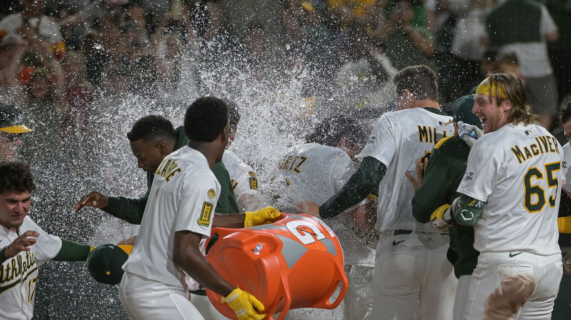 Athletics first baseman Nick Kurtz (16) celebrates with team mates after hitting a walk off home run against the Houston Astros during the ninth inning at Sutter Health Park.