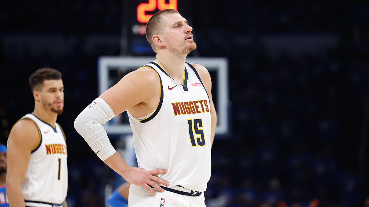 Denver Nuggets center Nikola Jokic (15) watches Oklahoma City Thunder guard Shai Gilgeous-Alexander shoot free throws in the second half of game seven of the second round for the 2025 NBA Playoffs at Paycom Center.
