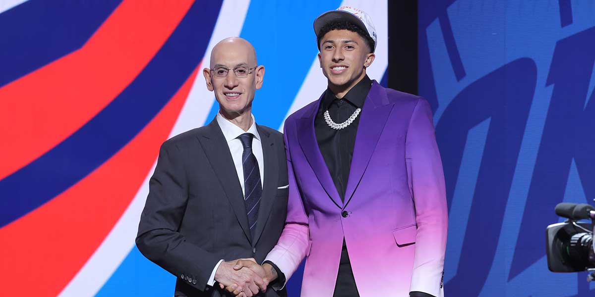 Nique Clifford stands with NBA commissioner Adam Silver after being selected as the 24th pick by the Oklahoma City Thunder in the first round of the 2025 NBA Draft at Barclays Center.