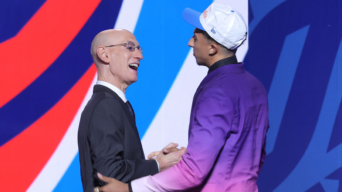 Nique Clifford greets NBA commissioner Adam Silver after being selected as the 24th pick by the Oklahoma City Thunder in the first round of the 2025 NBA Draft at Barclays Center.