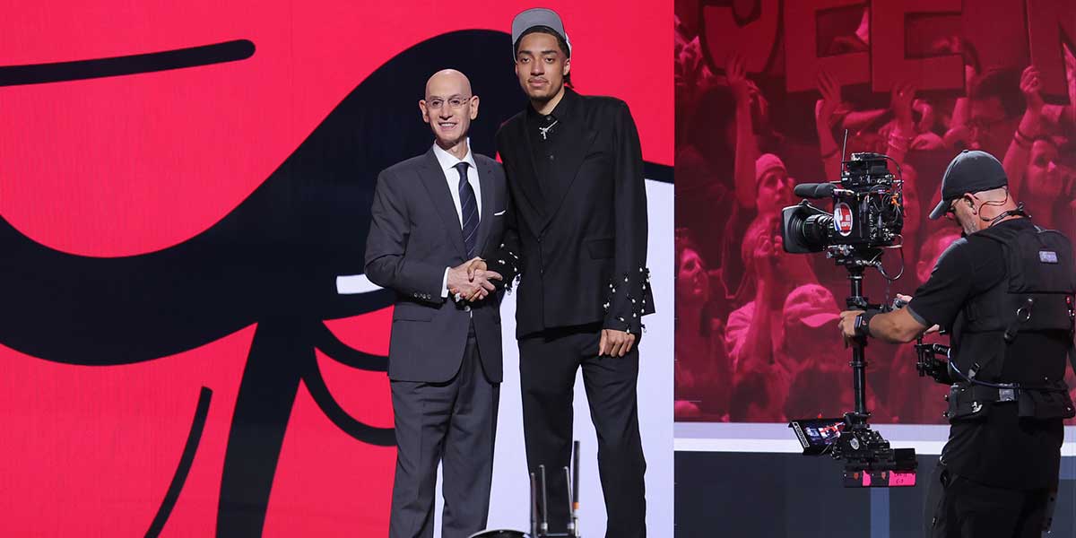 Noa Essengue stands with NBA commissioner Adam Silver after being selected as the 12th pick by the Chicago Bulls in the first round of the 2025 NBA Draft at Barclays Center.