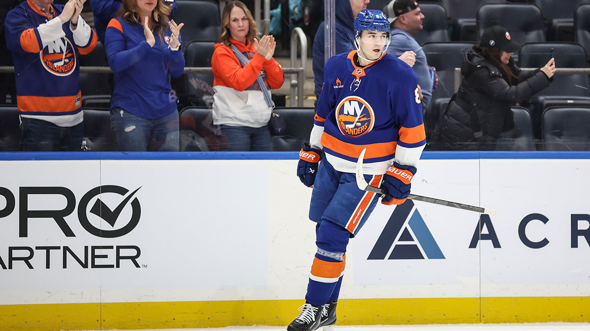New York Islanders defenseman Noah Dobson (8) circles back to center ice after scoring a goal in the third period against the Minnesota Wild at UBS Arena.