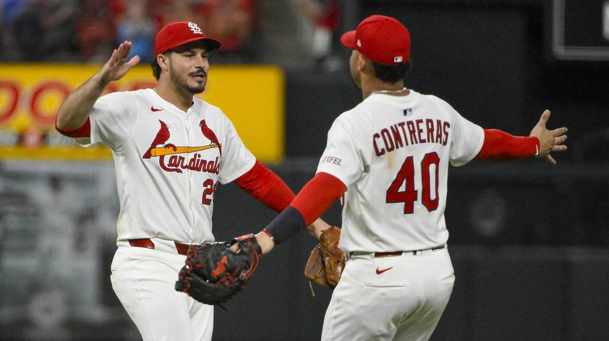 St. Louis Cardinals third baseman Nolan Arenado (28) celebrates with first baseman Willson Contreras (40) after the Cardinals defeated the Chicago Cubs at Busch Stadium.