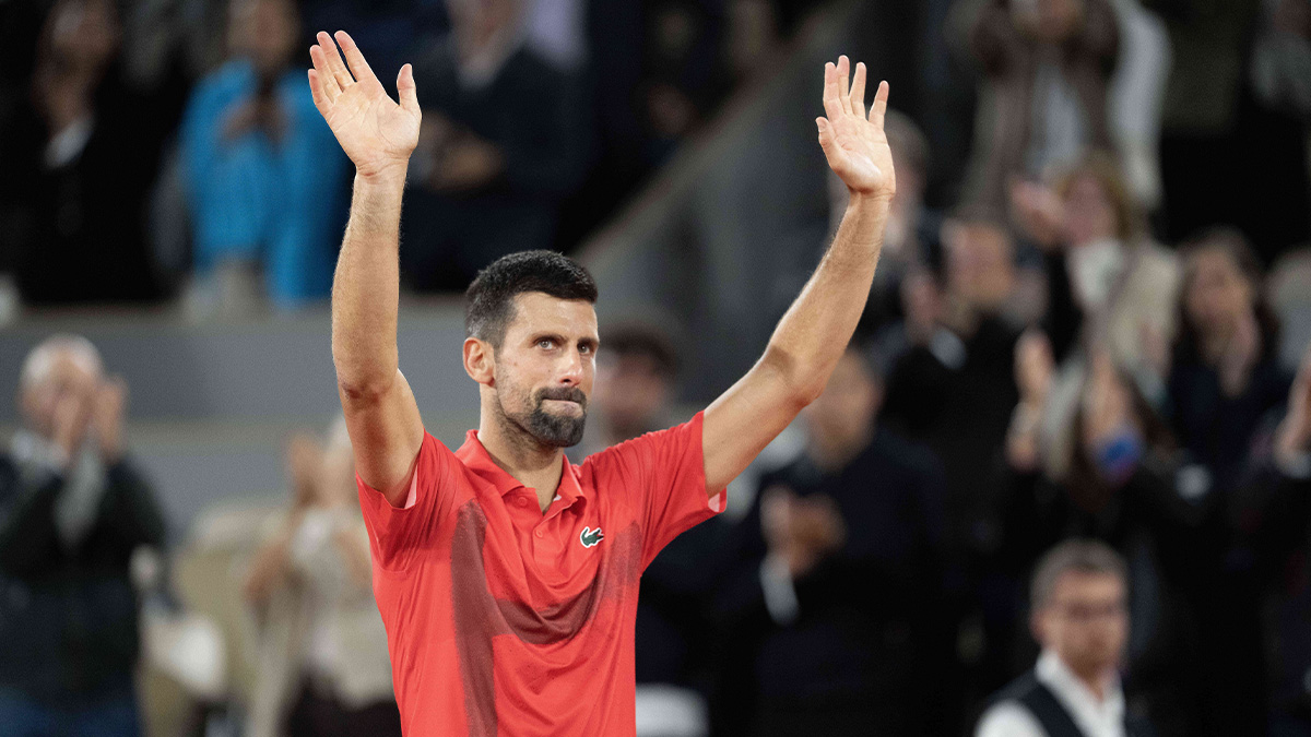 Novak Djokovic of Serbia says goodbye to the spectators and the clay after losing his match against Jannik Sinner of Italy on day 13 at Roland Garros Stadium.