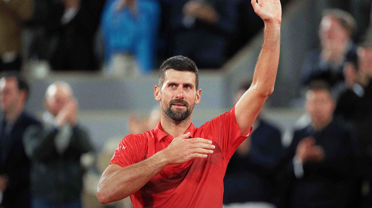 Novak Djokovic of Serbia says goodbye to the spectators and the clay after losing his match against Jannik Sinner of Italy on day 13 at Roland Garros Stadium.